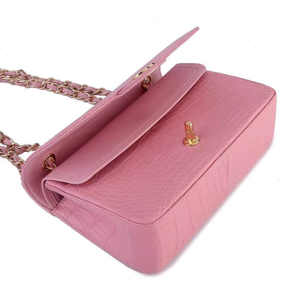 Pink crocodile leather shoulder handbag with classic flap and chain strap by Rossie Viren, stylish and elegant for women.