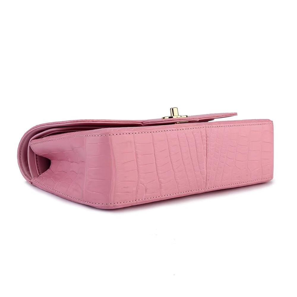 Pink crocodile leather shoulder handbag with classic flap and chain strap by Rossie Viren for women.