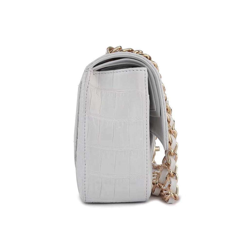 White crocodile leather shoulder handbag with classic flap and chain strap by Rossie Viren for women.