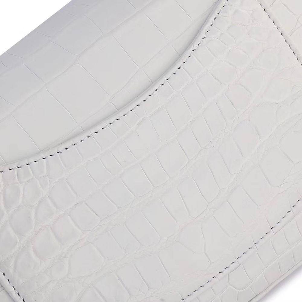 White crocodile leather shoulder handbag with a classic flap and chain strap by Rossie Viren.