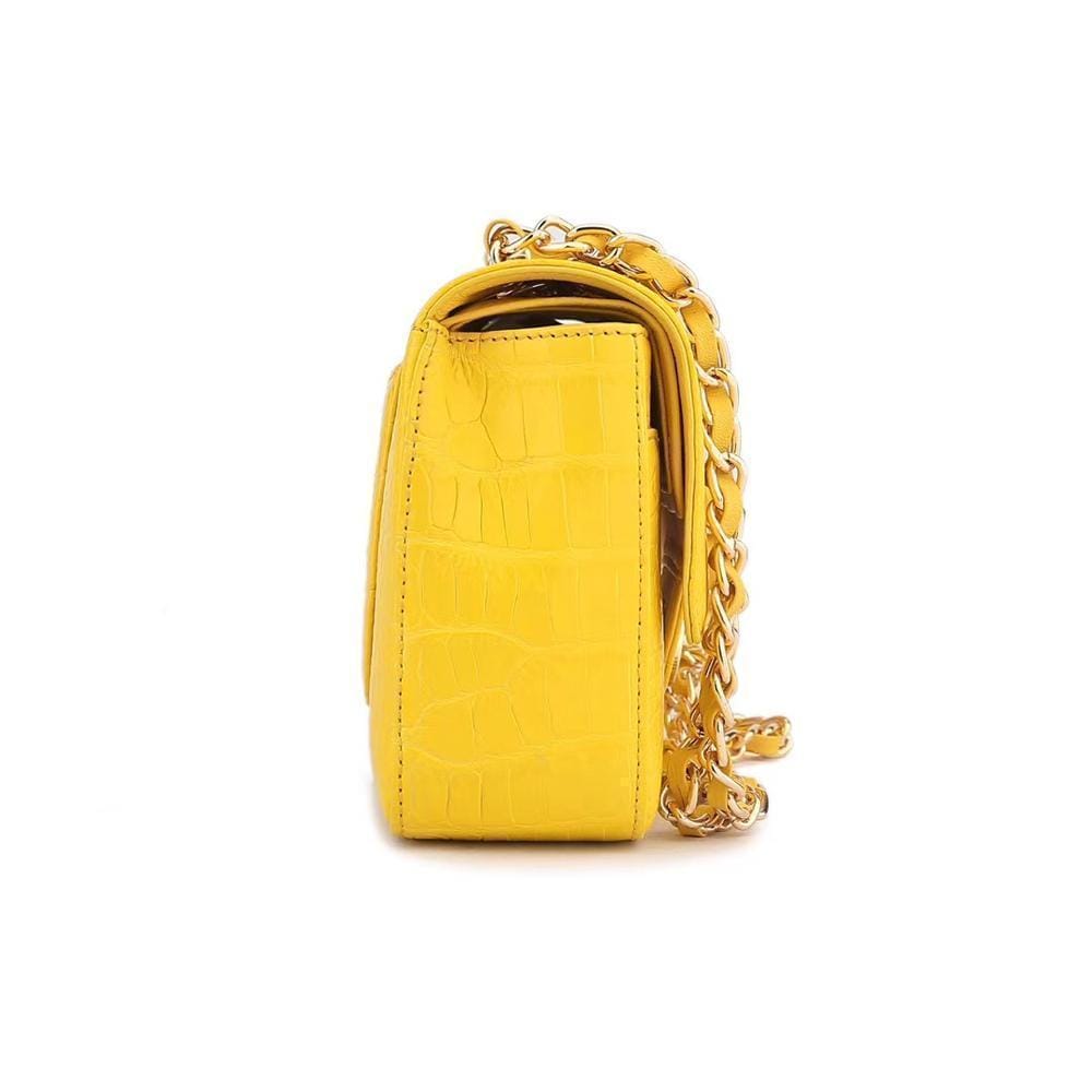 Yellow crocodile leather shoulder handbag with classic flap and chain strap by Rossie Viren for women.