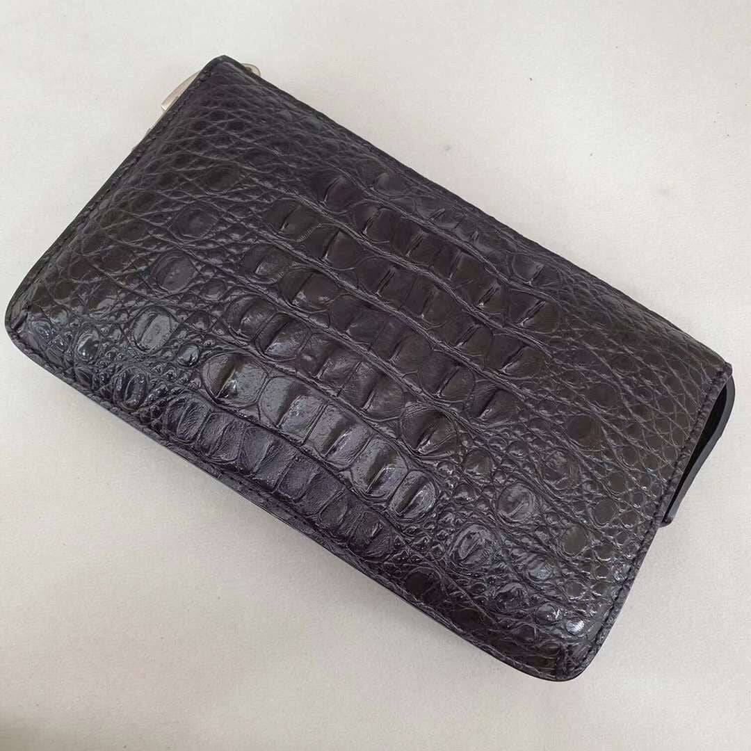 Rossie Viren crocodile bone leather clutch bag with sleek design and textured crocodile pattern, perfect for elegant occasions.