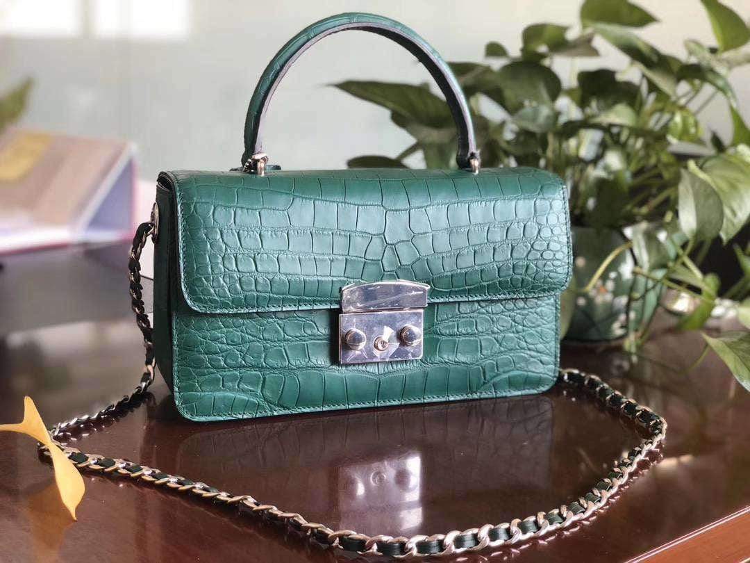 Rossie Viren crocodile leather crossbody messenger handbag with top handle, stylish and textured for versatile wear.