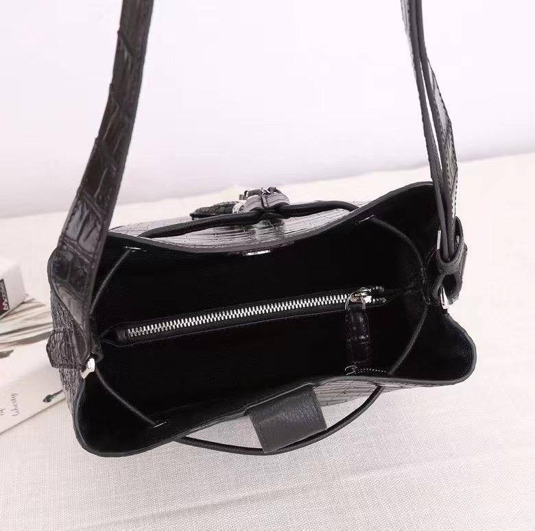 Unisex crocodile leather drawstring bucket shoulder purse by Rossie Viren with large capacity and crossbody strap.