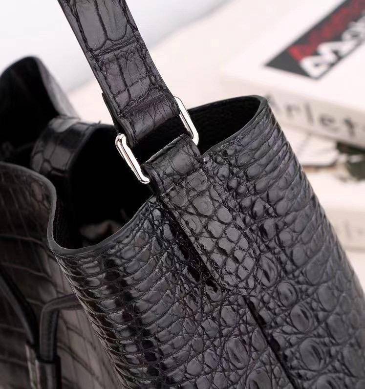 Unisex crocodile leather drawstring bucket shoulder purse by Rossie Viren with crossbody strap and large capacity.