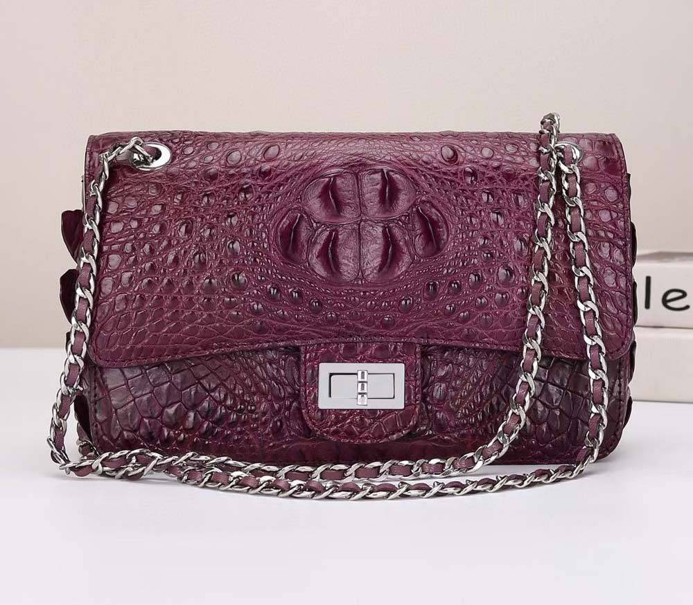 Wine red crocodile leather shoulder handbag with flap and chain strap by Rossie Viren.