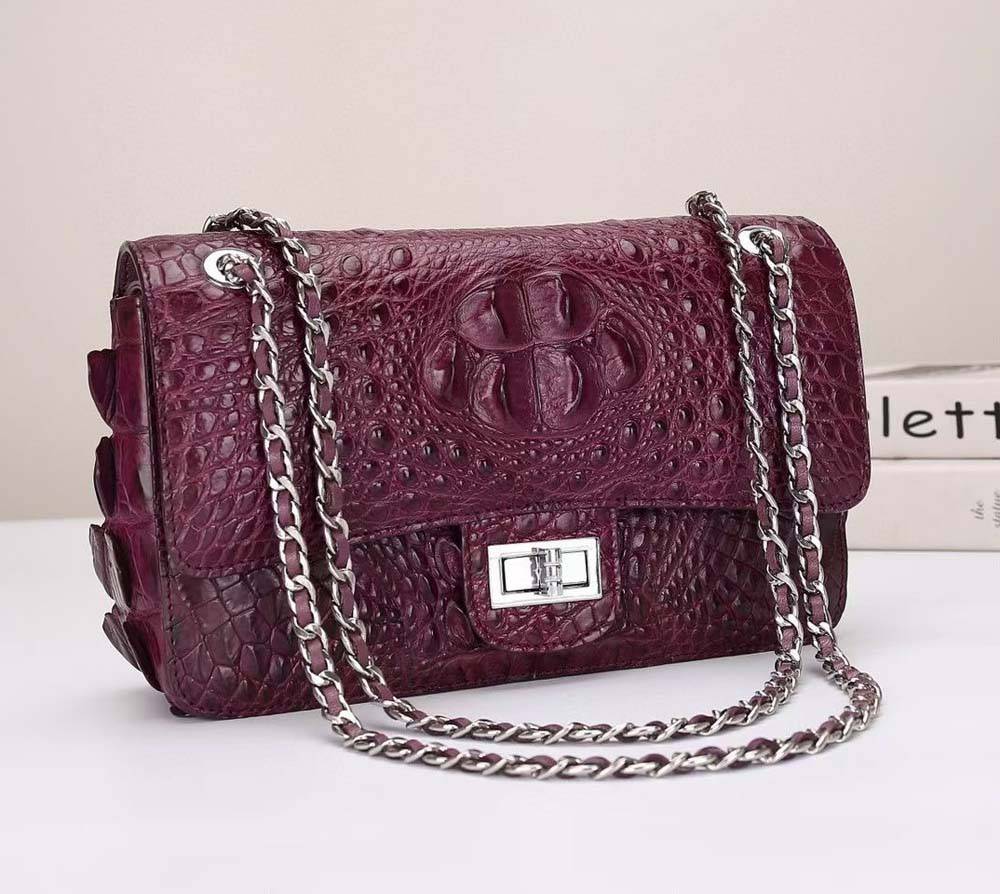 Wine red crocodile leather flap chain shoulder handbag by Rossie Viren with gold-tone chain and elegant design.