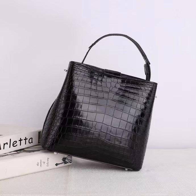 Rossie Viren crocodile leather hobo shoulder bag with a barrel crossbody design, featuring a textured crocodile pattern and spacious interior.