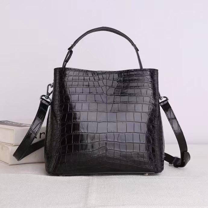 Rossie Viren crocodile leather hobo shoulder bag with barrel crossbody design and spacious messenger style.