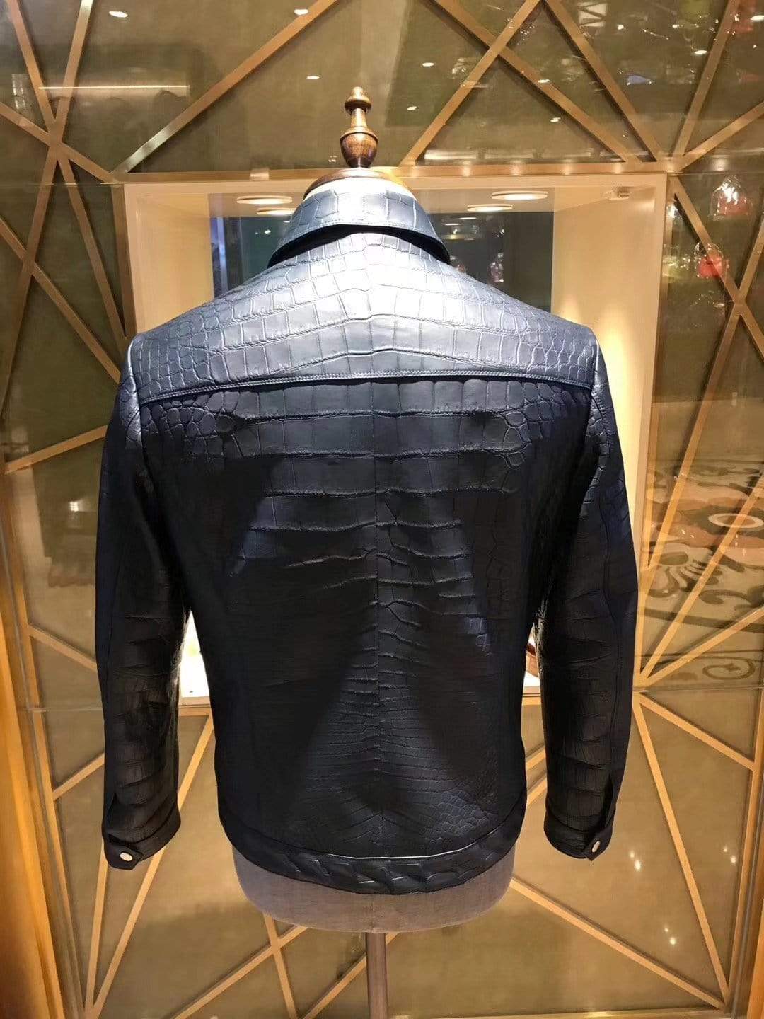 Black crocodile leather men's jacket by Rossie Viren, featuring a sleek design with textured crocodile pattern and tailored fit.