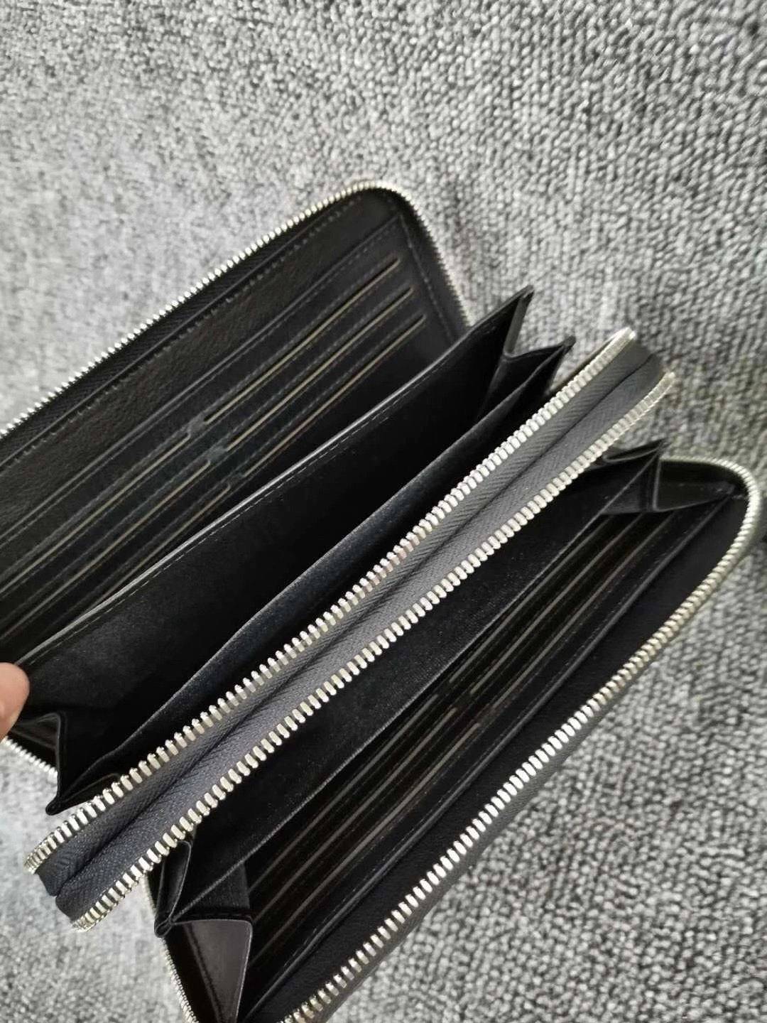 Rossie Viren crocodile leather clutch wallet with multiple compartments and large volume for credit cards and essentials.