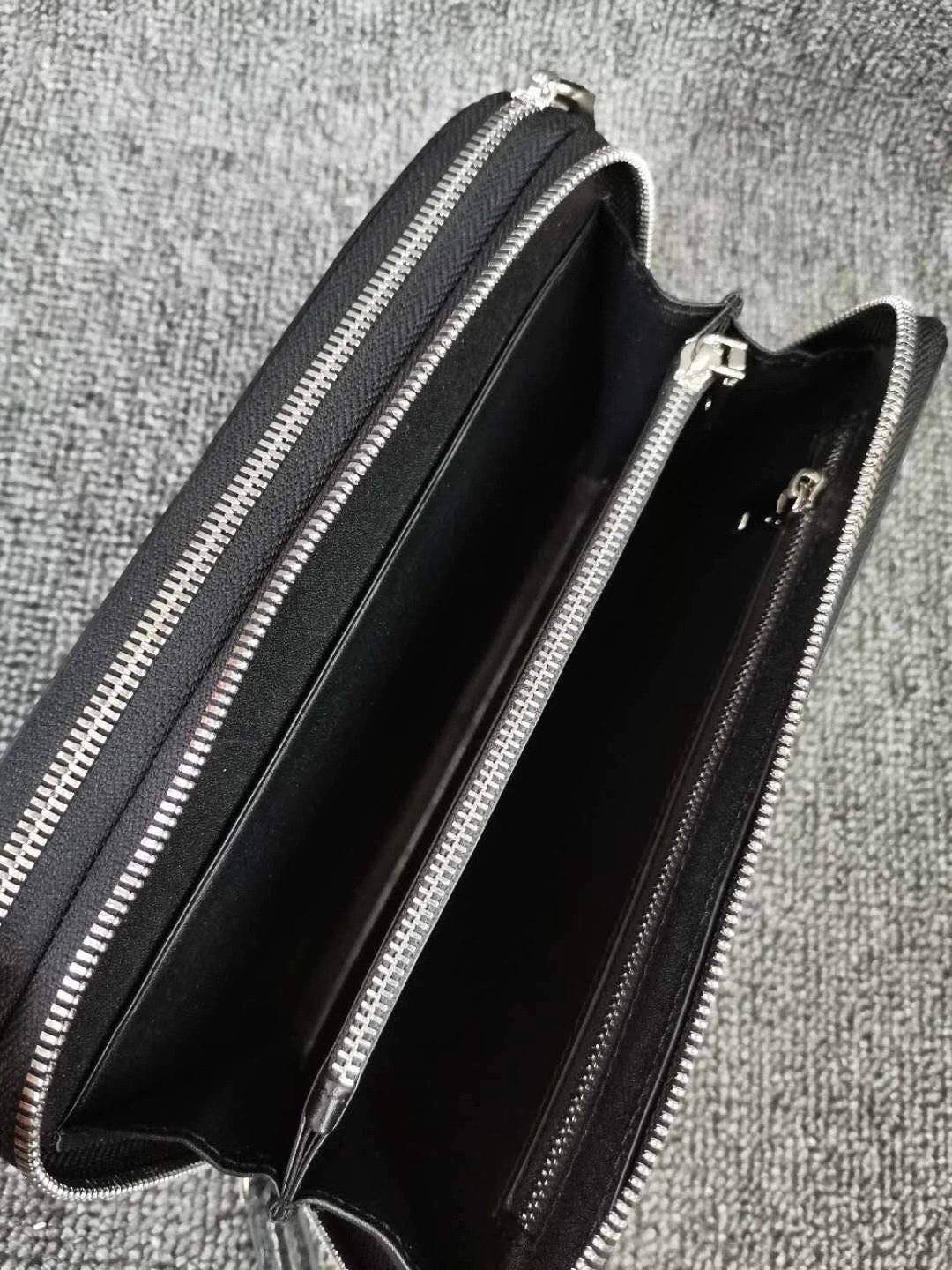 Rossie Viren crocodile leather clutch wallet with multiple compartments and large volume for credit cards and cash.