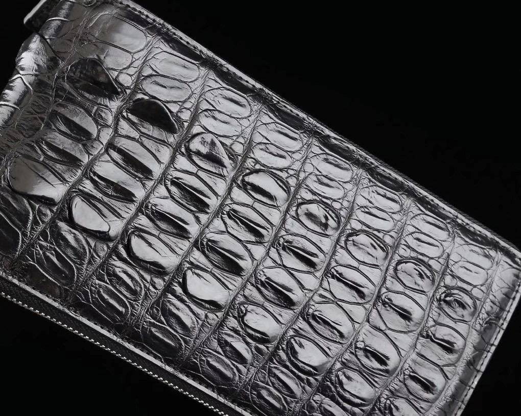 Rossie Viren crocodile leather clutch wallet with multiple compartments and large capacity for credit cards and essentials.