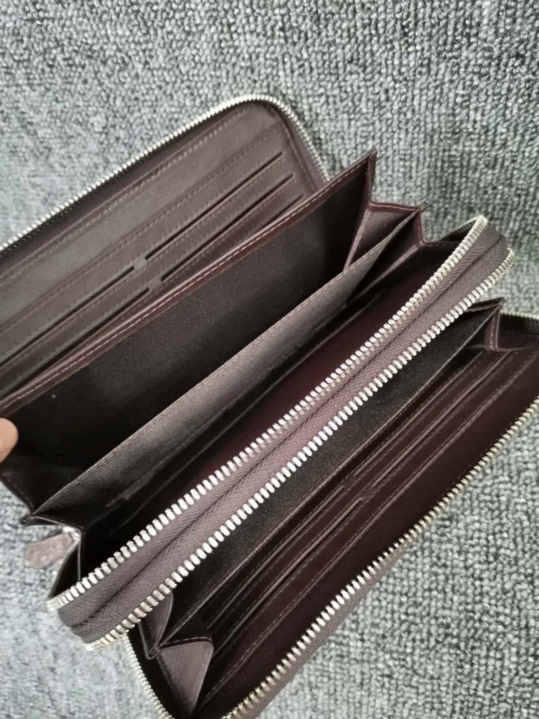 Rossie Viren crocodile leather clutch wallet with multiple card compartments and large capacity for credit cards and cash.