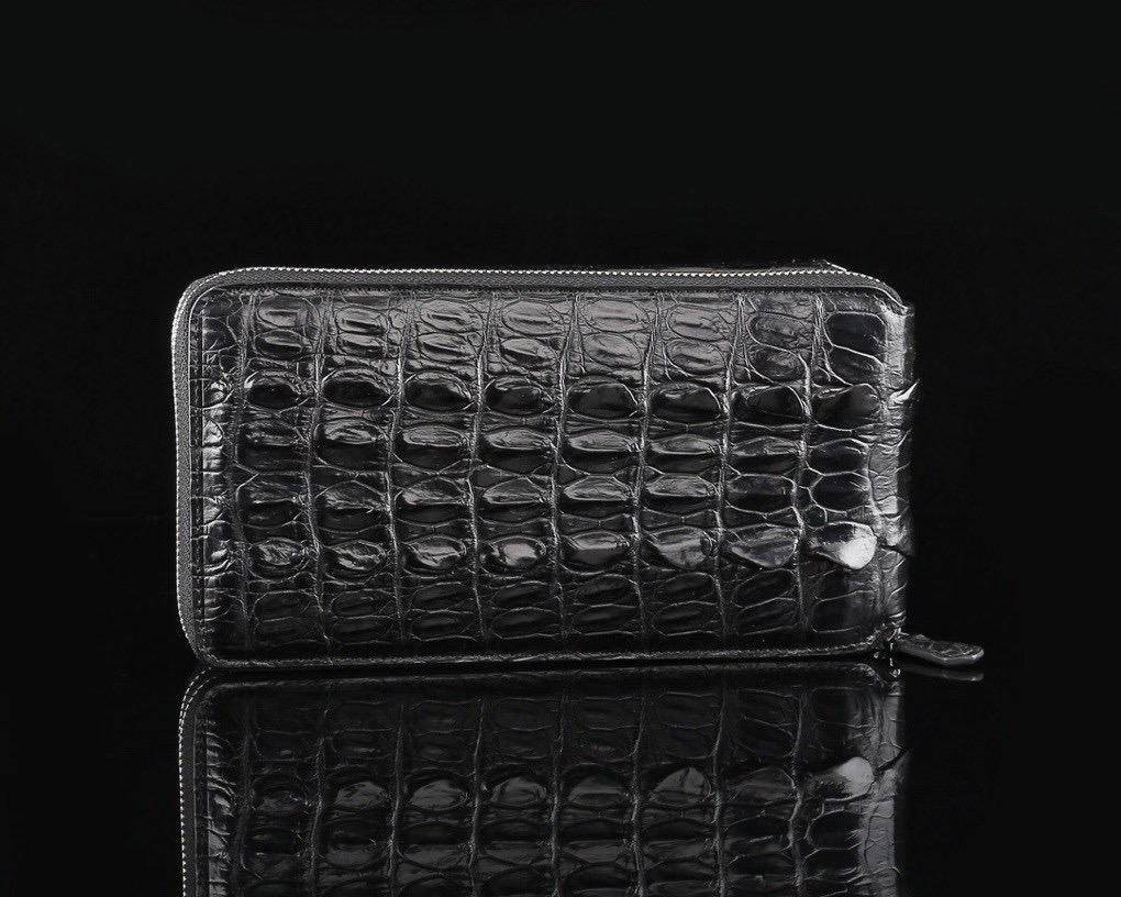 Rossie Viren crocodile leather clutch wallet with multiple compartments and large capacity for credit cards and essentials.