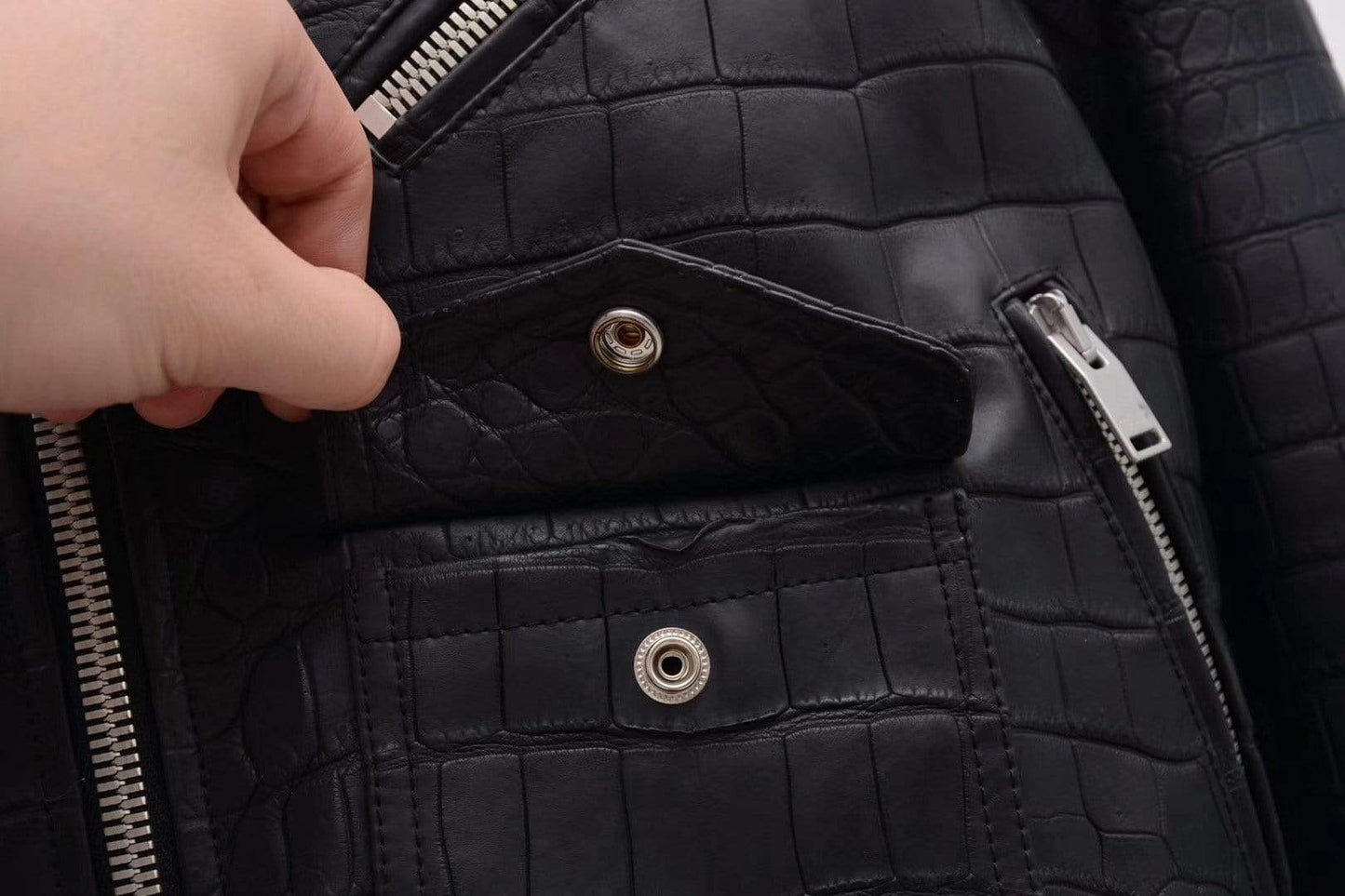 Black crocodile leather motorcycle jacket by Rossie Viren, slim fit racer style for men and women, with detailed leather texture.