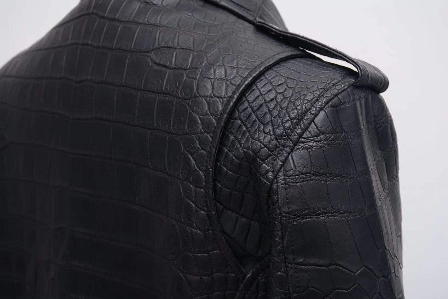 Black crocodile leather slim fit motorcycle racer jacket for men and women by Rossie Viren, featuring a sleek, stylish design.