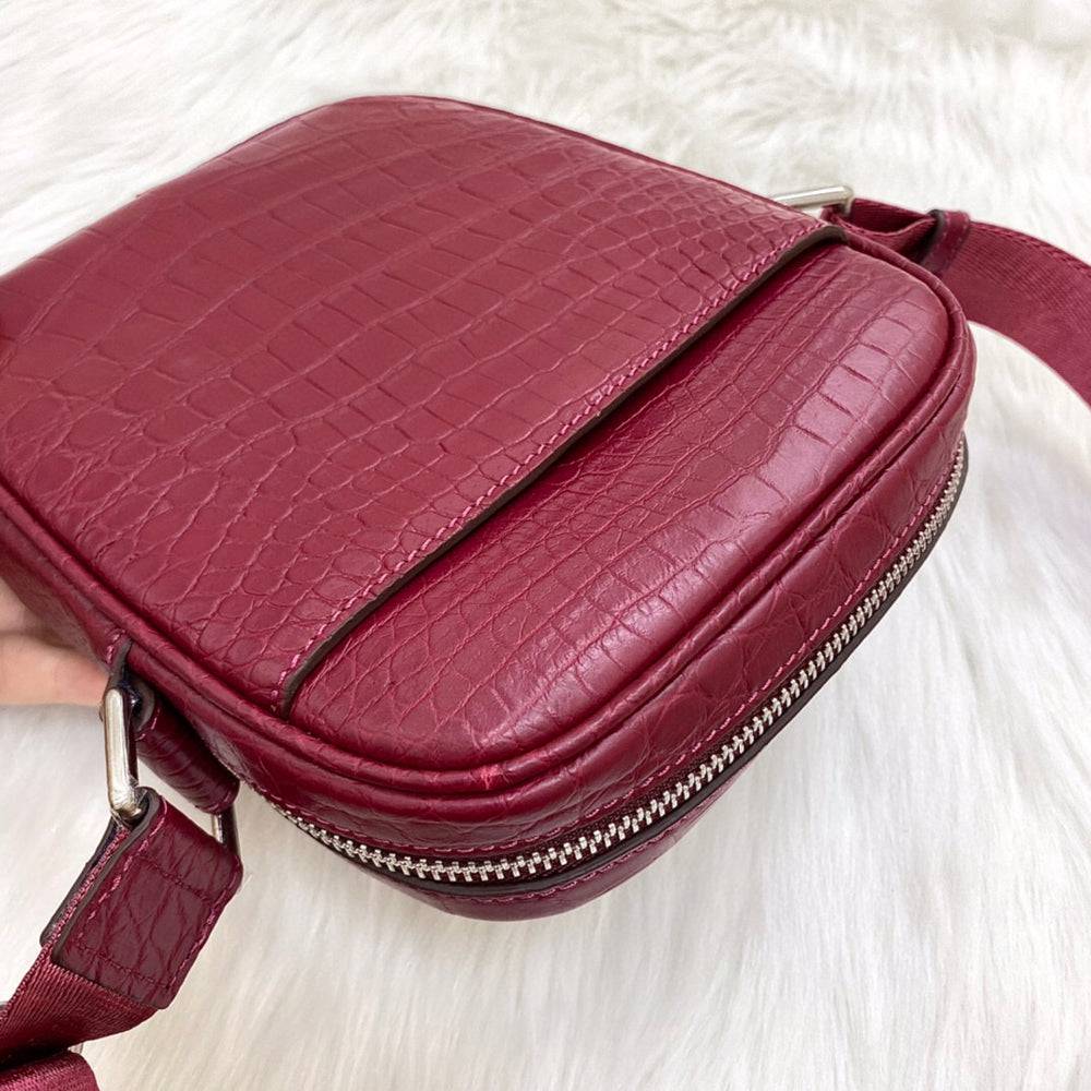 Rossie Viren crocodile leather small crossbody shoulder handbag with adjustable strap and sleek design.