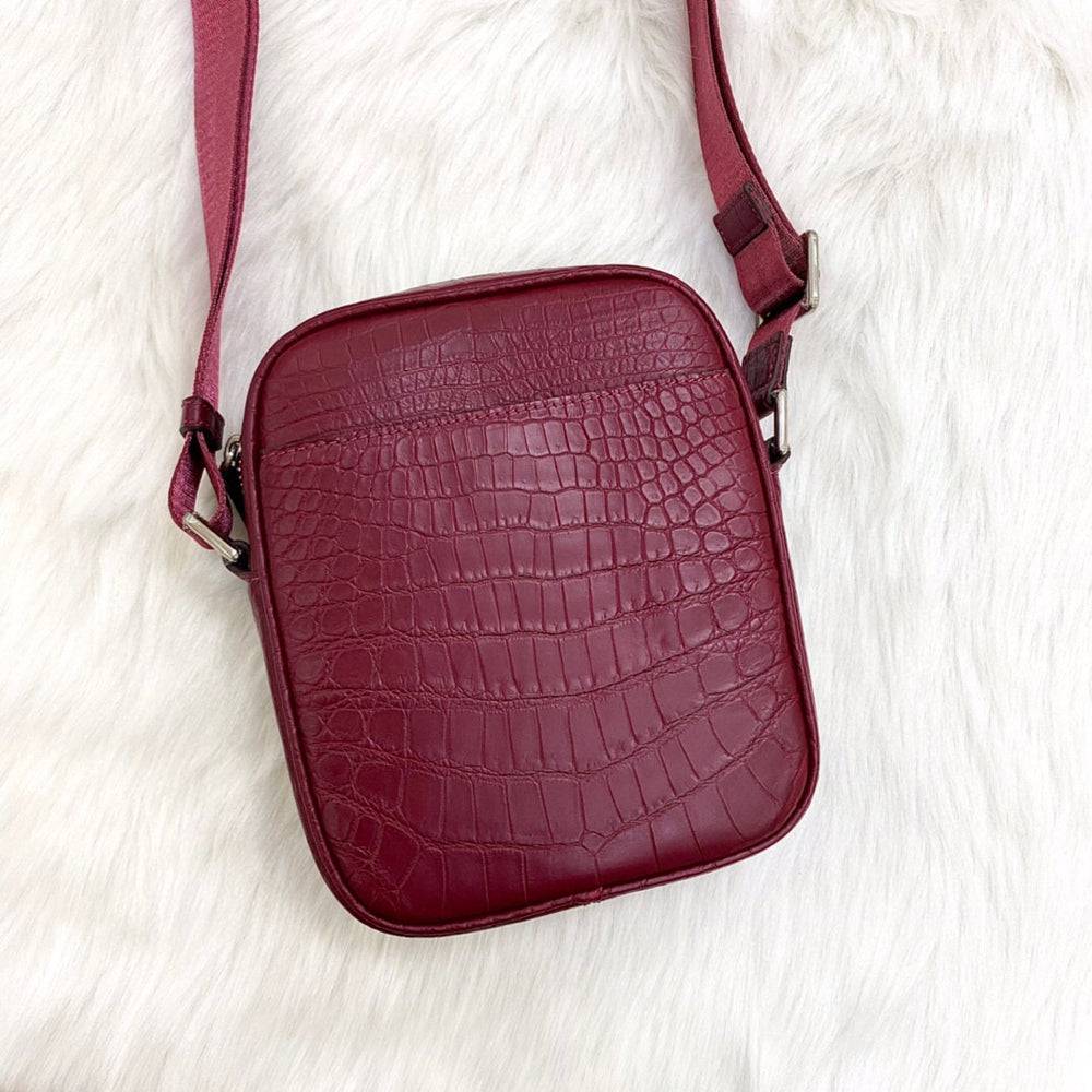 Rossie Viren crocodile leather small crossbody shoulder handbag with sleek design and adjustable strap.