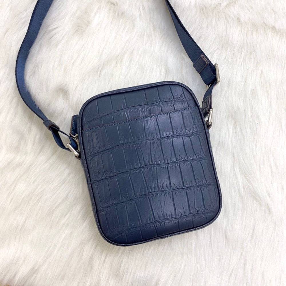Rossie Viren crocodile leather small crossbody shoulder handbag with sleek design and textured crocodile pattern.