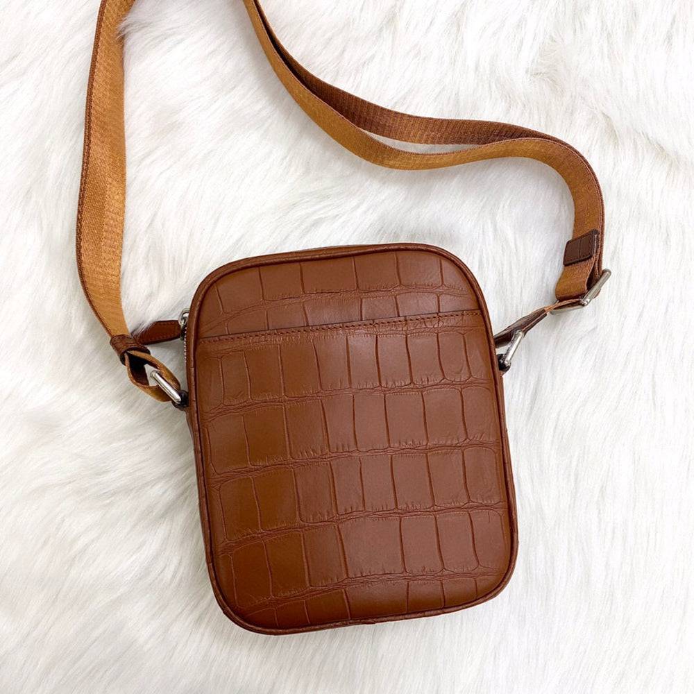Rossie Viren crocodile leather small crossbody shoulder handbag with sleek design and textured crocodile pattern.