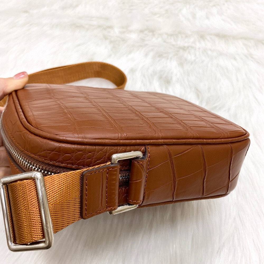 Rossie Viren crocodile leather small crossbody shoulder bag showing textured crocodile skin and compact design.