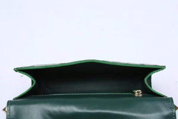 Dark green crocodile leather top handle handbag by Rossie Viren, featuring a sleek and elegant design with sturdy handles.
