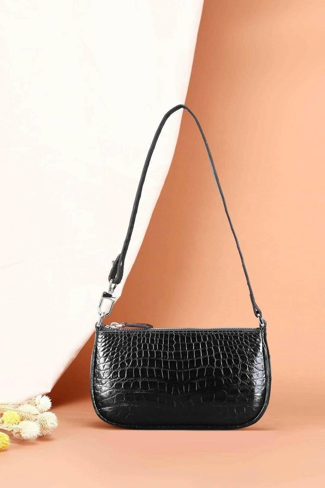 Rossie Viren crocodile leather underarm shoulder handbag with sleek design and textured crocodile pattern.