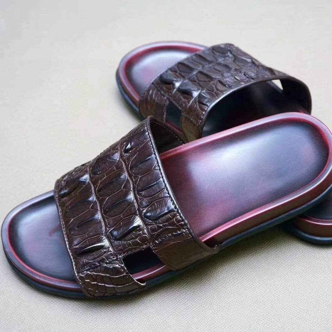 Genuine crocodile bone leather men's slippers by Rossie Viren, featuring textured crocodile skin and classic slip-on design.
