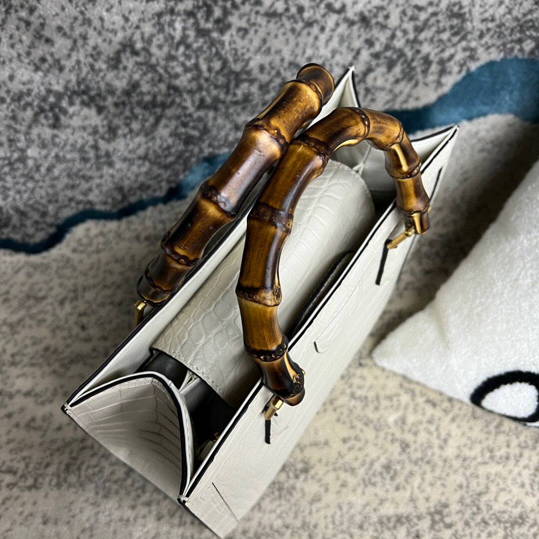White crocodile skin leather shoulder crossbody handbag with bamboo handle by Rossie Viren