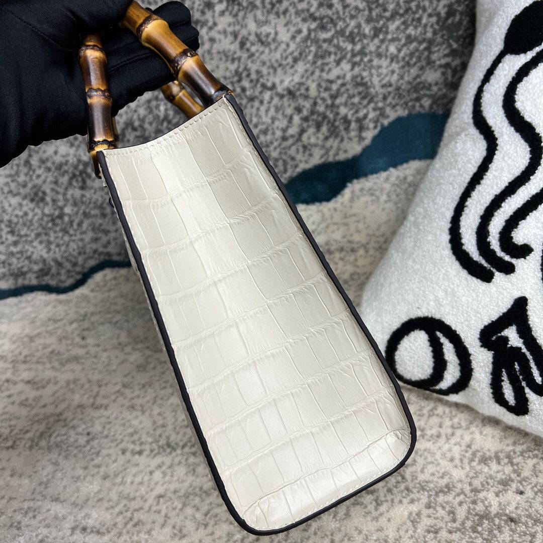 White crocodile skin leather shoulder crossbody handbag with bamboo handle by Rossie Viren