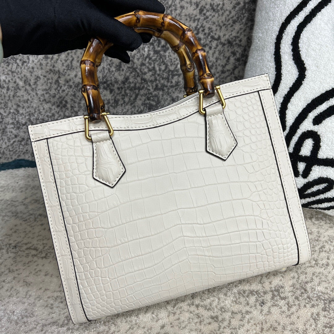 White crocodile skin leather shoulder crossbody bag with bamboo handle by Rossie Viren, stylish handbag with textured finish.