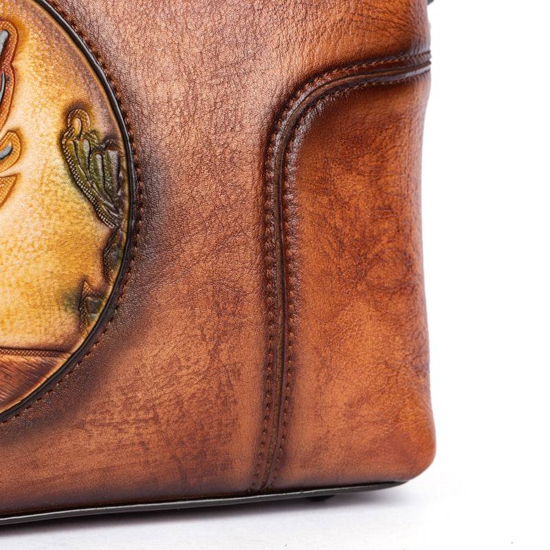 Rossie Viren women's vintage leather shoulder tote bag with large capacity and round handle, stylish and functional handbag.
