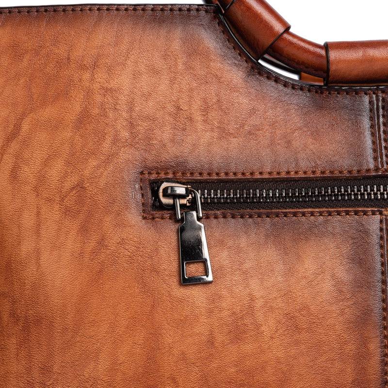 Rossie Viren women's vintage leather shoulder tote bag with large capacity and round handle, stylish and functional handbag.
