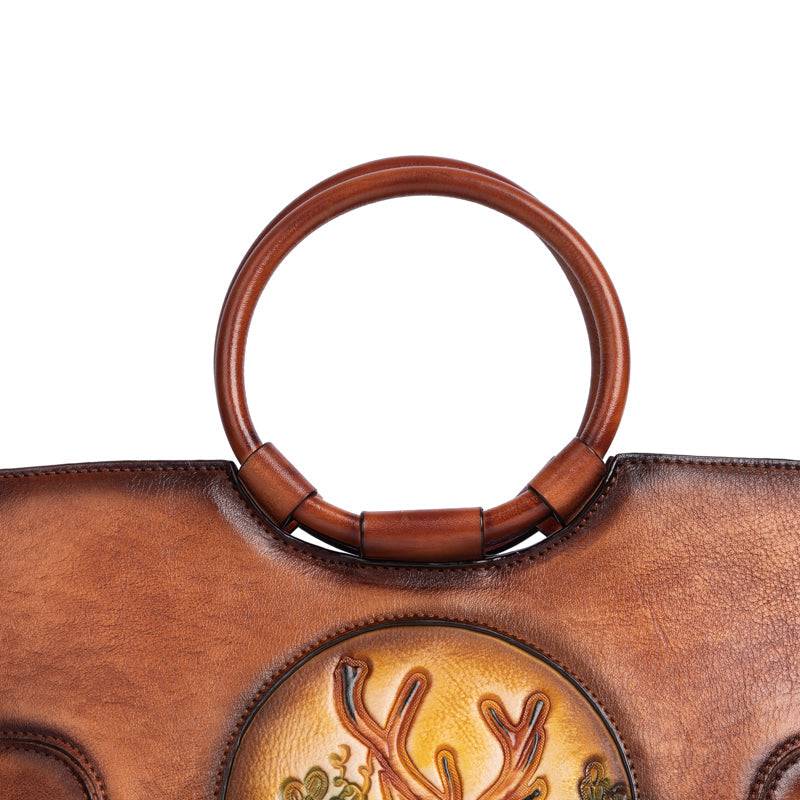 Rossie Viren women's vintage leather shoulder tote bag with large capacity, round handle, and classic fashion style.