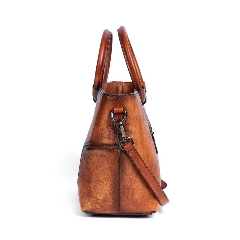 Rossie Viren women's vintage leather shoulder tote bag with large capacity and round handle, stylish and functional fashion handbag.