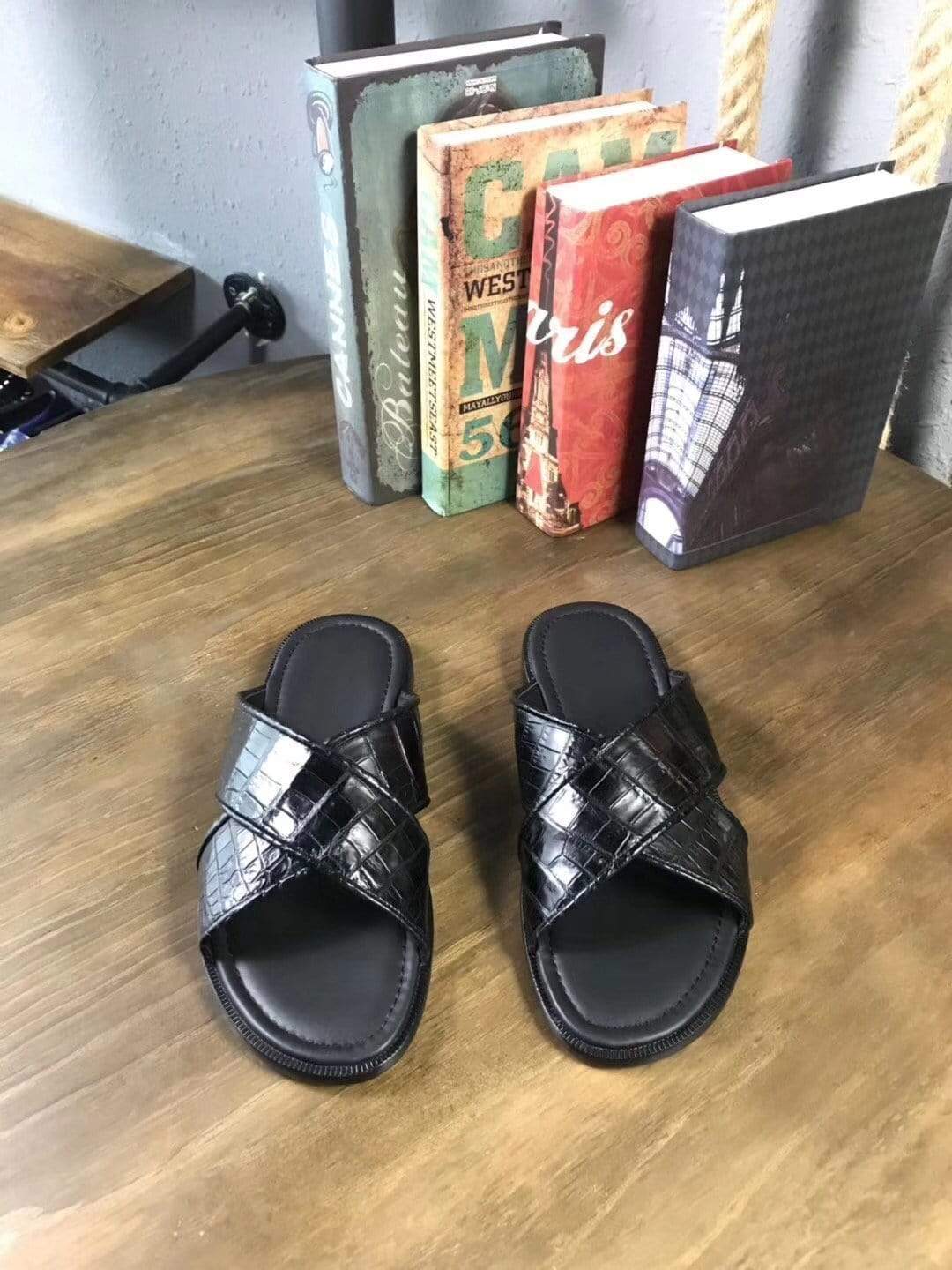 Genuine crocodile belly leather men's slippers by Rossie Viren, showcasing luxurious textured crocodile skin and classic slip-on design.