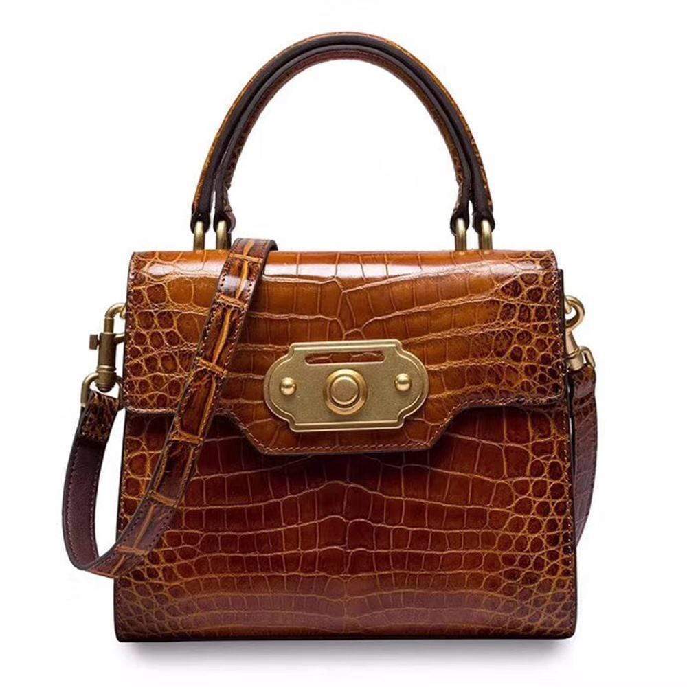 Genuine crocodile belly leather top handle shoulder handbag by Rossie Viren with a sleek, luxurious design and polished finish.
