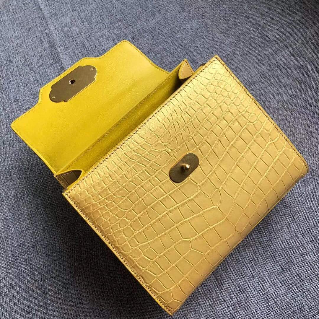 Rossie Viren genuine crocodile belly leather handbag with top handle, shoulder strap, and elegant design.