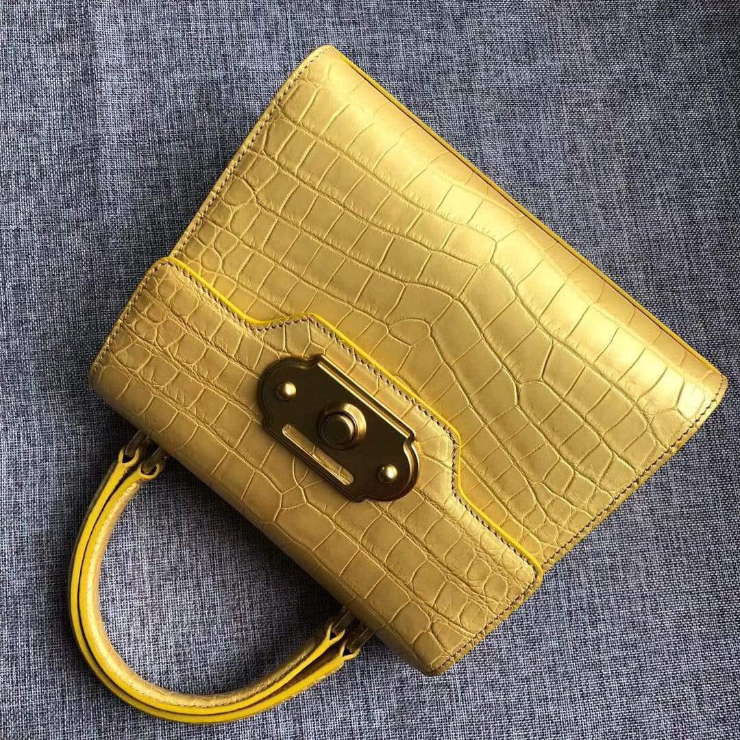 Genuine crocodile belly leather handbag with top handle and shoulder strap, Rossie Viren luxury purse with textured crocodile pattern.