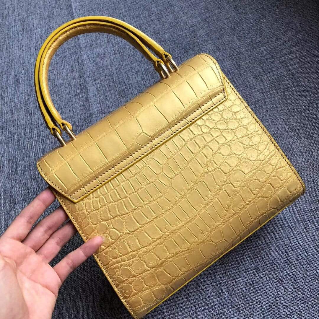 Genuine crocodile belly leather top handle shoulder purse bag by Rossie Viren with elegant design and textured crocodile pattern.