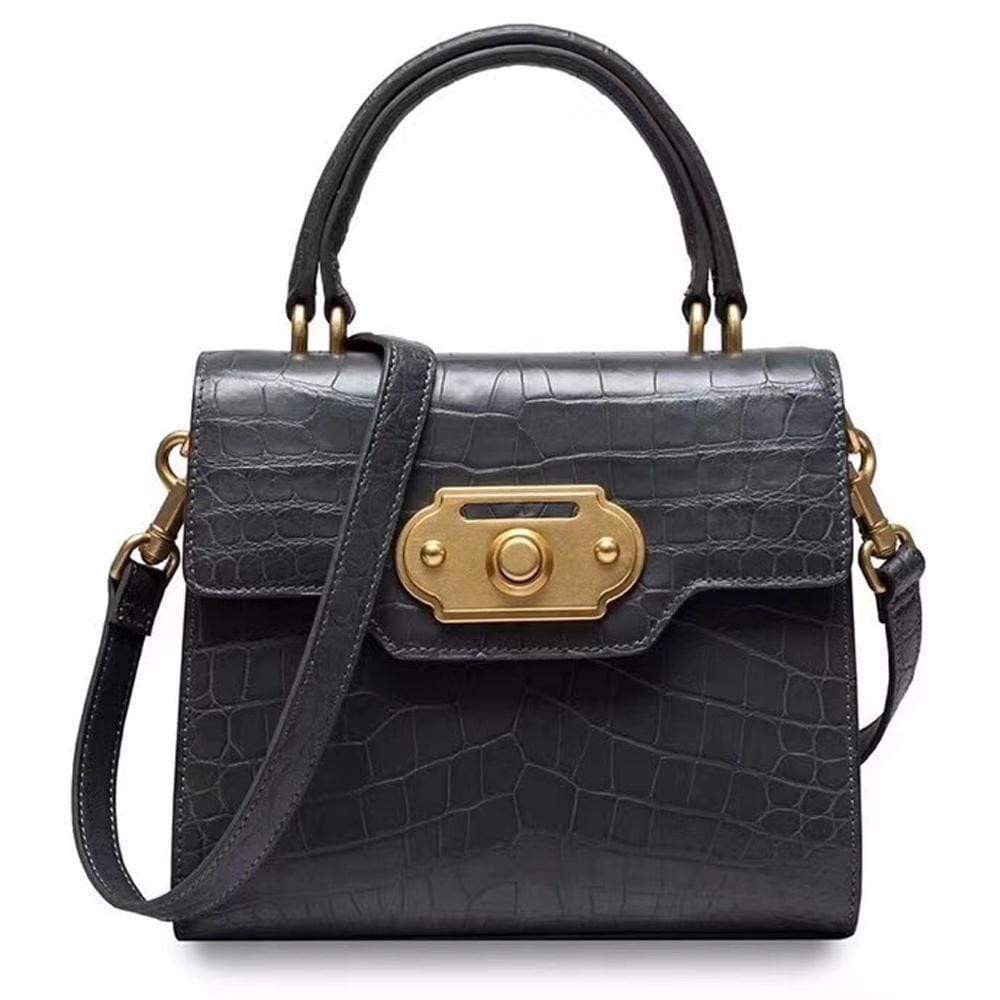 Rossie Viren genuine crocodile belly leather handbag with top handle and shoulder strap, showcasing luxurious textured leather.