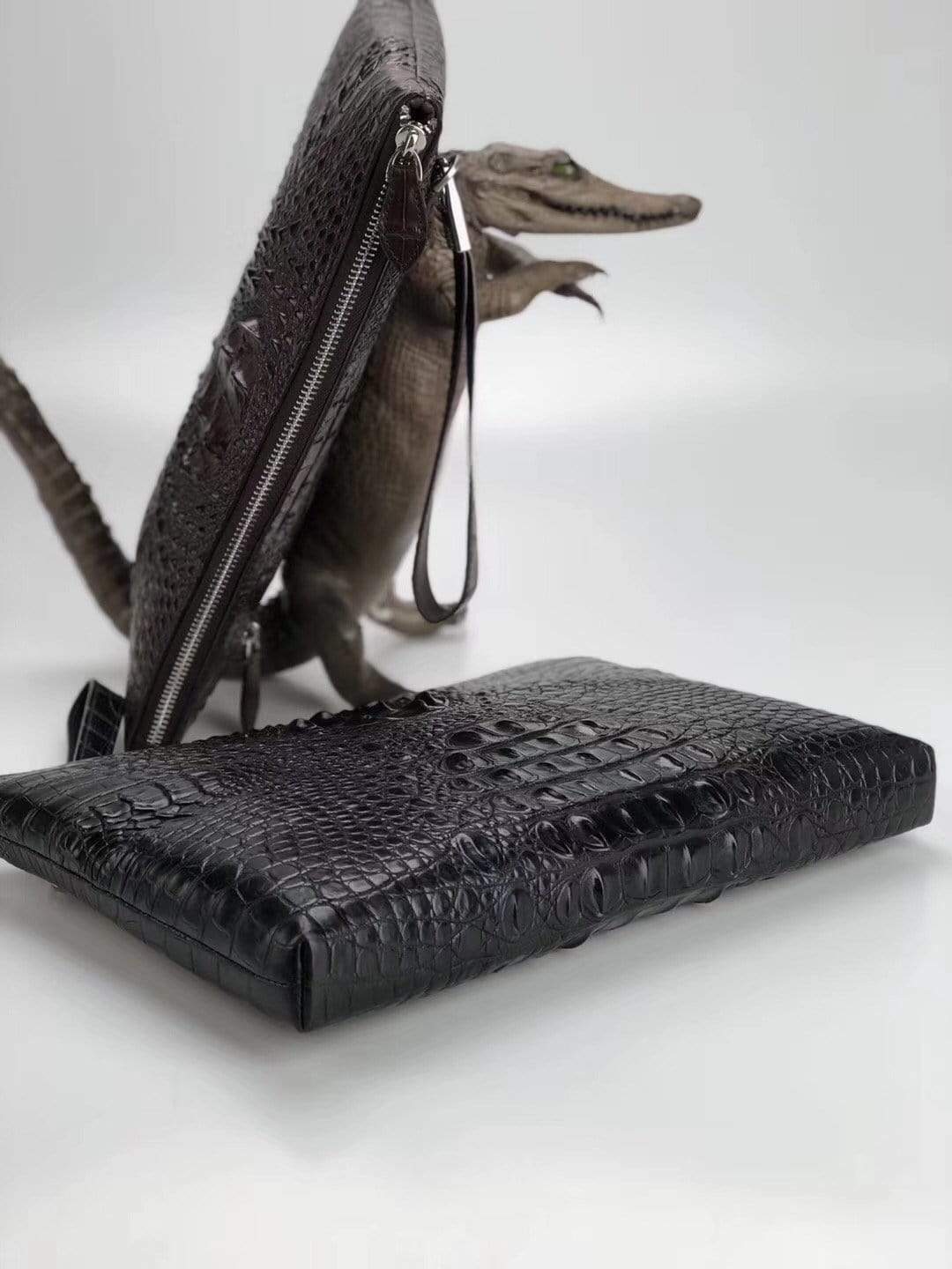 Rossie Viren genuine crocodile bone leather medium iPad clutch bag with sleek design and durable construction.