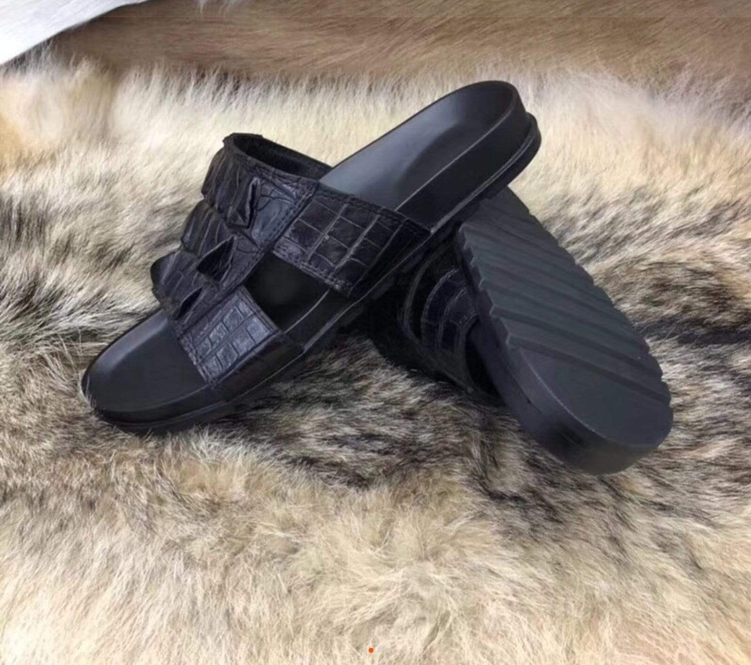 Genuine crocodile bone leather men's slipper by Rossie Viren, showcasing a luxurious textured crocodile skin design.