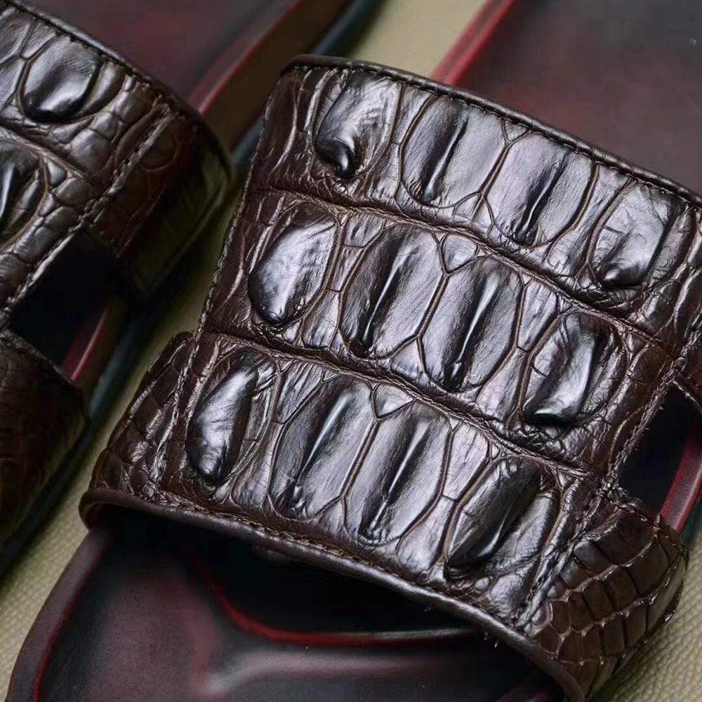 Genuine crocodile bone leather men's slippers by Rossie Viren, showcasing a luxurious crocodile skin design and craftsmanship.