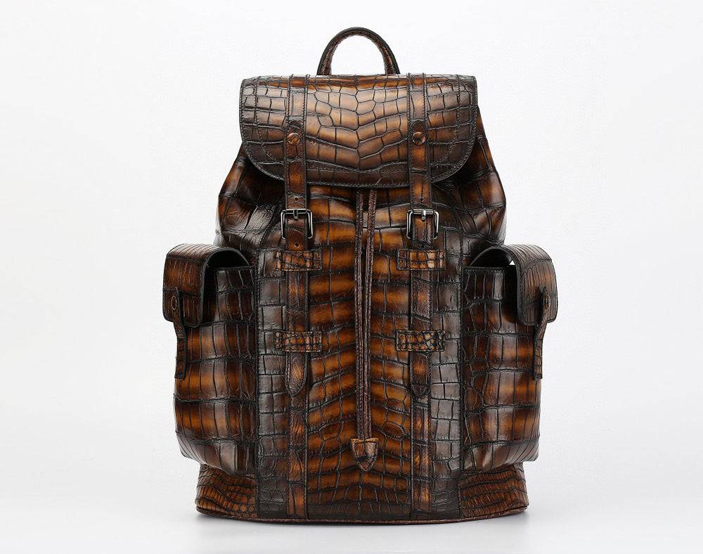 Genuine crocodile leather handbag by Rossie Viren featuring a sleek design, sturdy handle, and textured crocodile pattern.