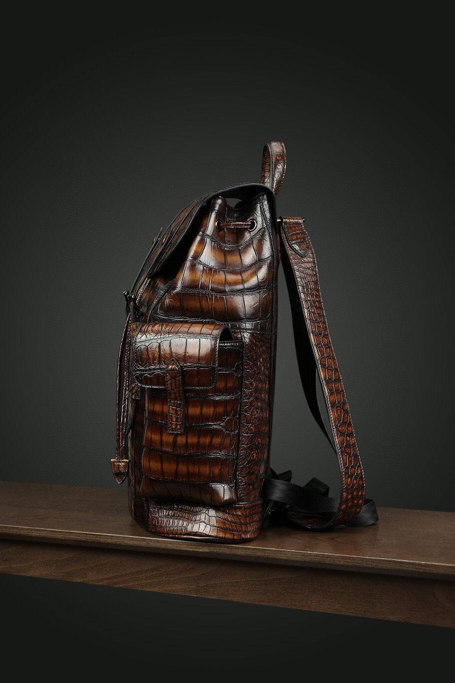 Genuine crocodile leather Rossie Viren handbag backpack with adjustable straps and sleek design.