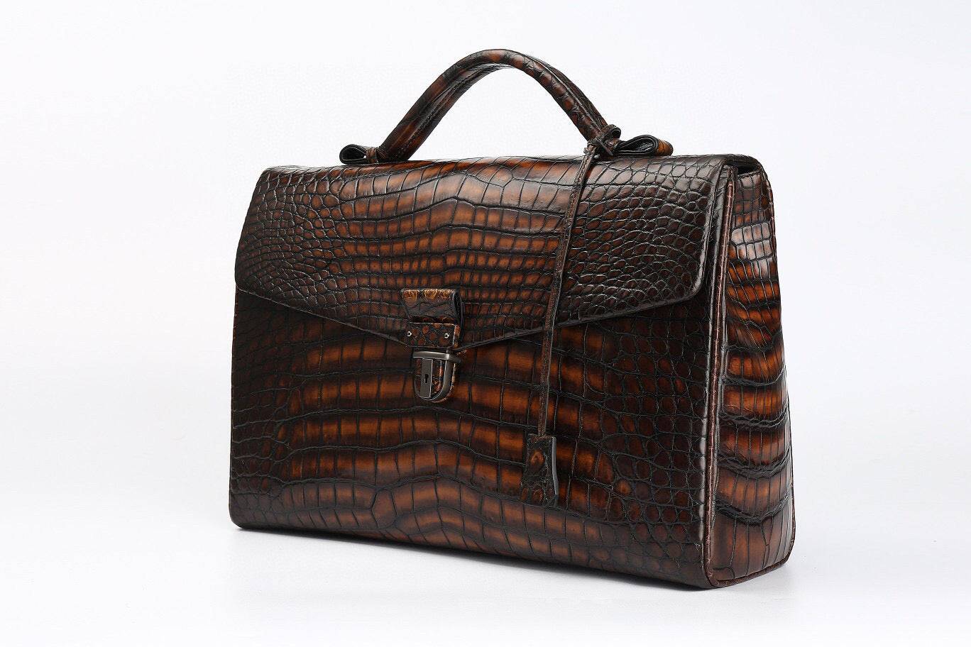 Genuine crocodile leather briefcase by Rossie Viren, vintage brown business bag with sturdy handles and sleek design.