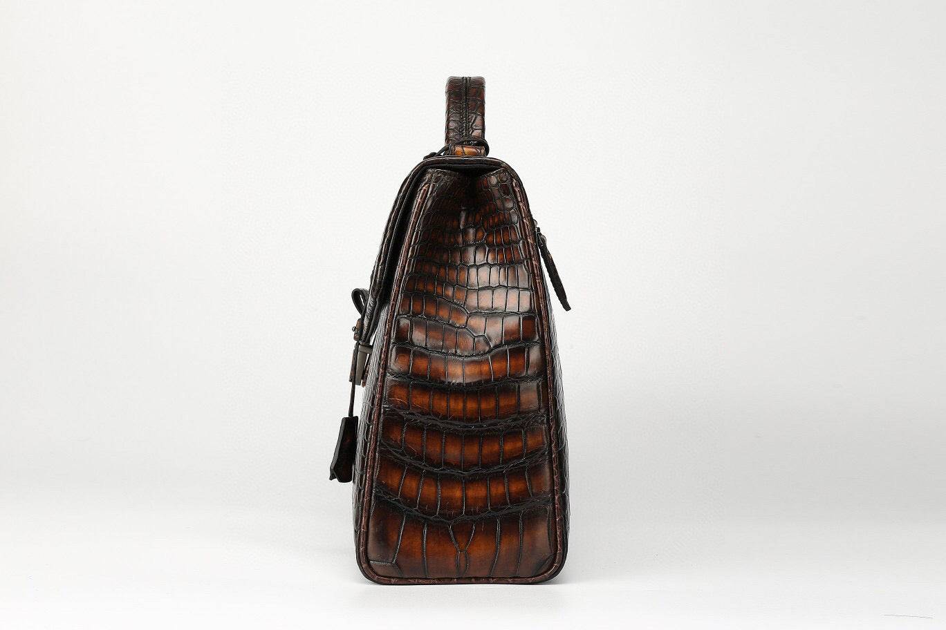 Vintage brown Crocodile Leather Briefcase handbag by Rossie Viren, featuring a sleek, textured crocodile pattern and sturdy handle.