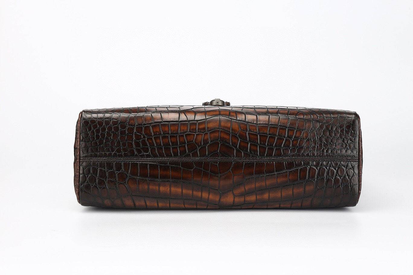 Genuine crocodile leather briefcase by Rossie Viren, vintage brown business handbag with textured crocodile pattern and sturdy handle.